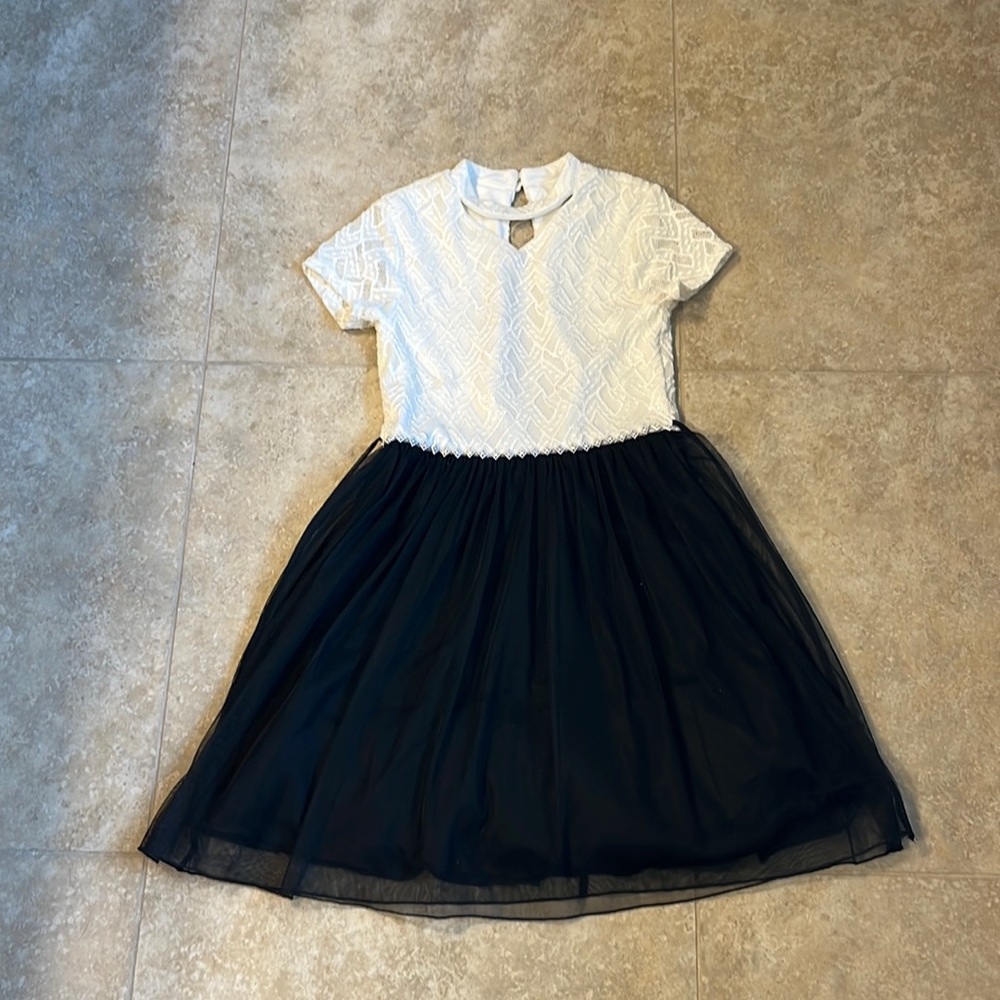 This is a Speechless Kids dress.